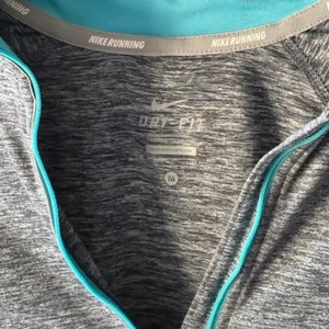 Nike Dri-FIT Element Women’s M Gray Teal Running 1/2 Zip Long Sleeve Pullover thumbnail 5
