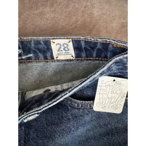 Free People We The Free Bailey Denim Mini Skirt Blue Fray Asymmetric Hem 28 NWT thumbnail 6