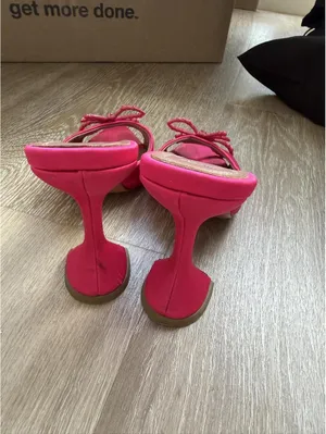 Amina Muaddi pink satin heels with rhinestone bow detail thumbnail 4