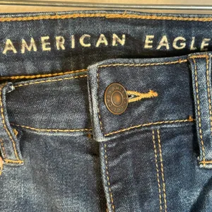 American Eagle Outfitters Hi‎ Rise Crop Flare Jeans Dark Wash Size 0 thumbnail 3