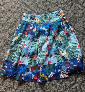 Anthropologie Maeve Blue Multicolor Brightly Floral Pleated Mini Skirt thumbnail 1