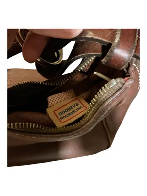 This is a vintage Dooney & Bourke Brown Pebbled Leather Shoulder Bag (Style J7276266). thumbnail 4