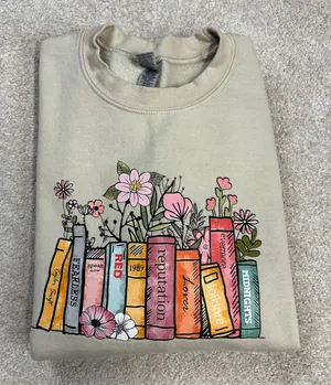 Gildan Taylor Swift Albums As Books Graphic Crewneck Beige Sweatshirt Size S thumbnail 1