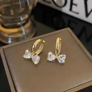 Gold Hoop Bow Earrings thumbnail 3