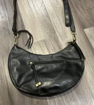 Anthropologie Black Faux Leather Hobo Bag with Metallic Hardware thumbnail 1