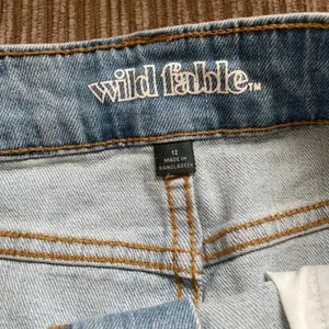 WILD FABLE Light Wash Denim Mini Skirt Size 12 thumbnail 10