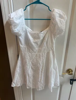Lulu's White Eyelet Puff-Sleeve Peplum Top thumbnail 1