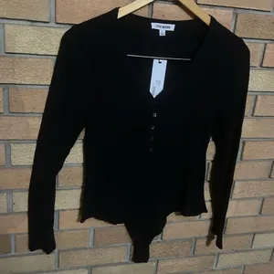 NWT Steve Madden Womens Solid Henley Ribbed Long Sleeve Bodysuit Black Size L thumbnail 1