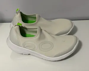 OOFOS Women's Slip-On Sneakers in Cream with Lime Green Accents thumbnail 1