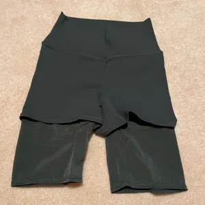 Alo yoga high waist mesh biker shorts - hunter green thumbnail 1