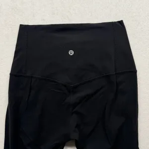 Lululemon Unlimit High-Rise Tight 25” Women’s Size 4 Black Yoga Leggings thumbnail 5