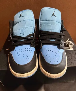 Air Jordan 1 low GS black/ university blue 7 Youth thumbnail 1