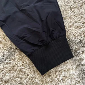 NWT NIKE Dri-FIT Bliss Mid-Rise 7/8 Joggers thumbnail 3