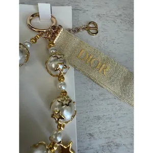 Dior NIB VIP Pearl Gold Star Holiday Bag Charm thumbnail 2