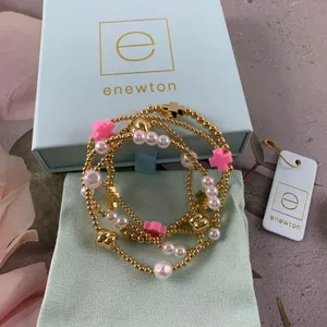Enewton 4‑Piece Stackable Bracelet Set Gold Bead Pink Cross Pearl Detail thumbnail 4