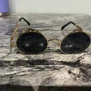 Round Gold and Black Sunglasses thumbnail 13