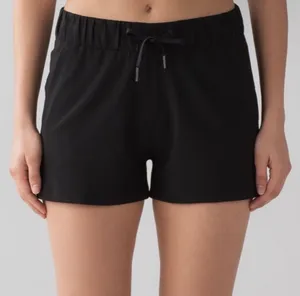 Lululemon On The Fly Woven Short Inseam 2.5" Black Size 12 thumbnail 1