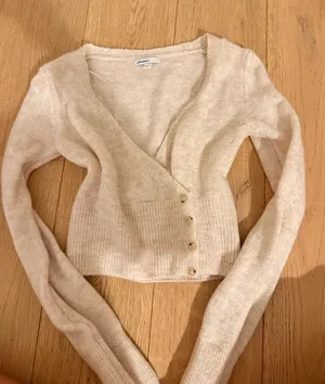Subdued Criss Cross Sweater  thumbnail 1