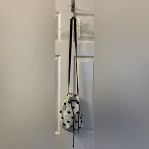 Cross body white with black hearts purse thumbnail 2