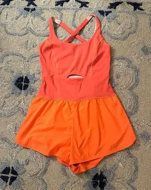 FP Movement by Free People Righteous Runsie in Orange thumbnail 1