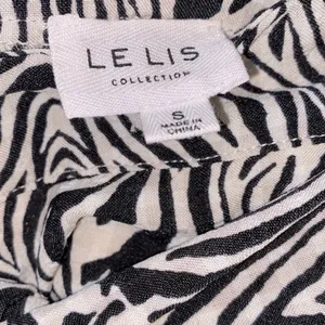 Le Lis safari print skirt size small thumbnail 5