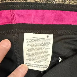 Nike Women’s Large DriFit Black with Pink Trim Capris thumbnail 3