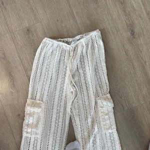 Chic Lace Wide Leg Pants in Cream thumbnail 2