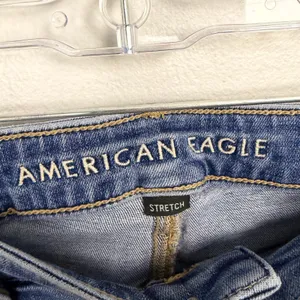 American Eagle Stretch Super Hi-Rise Flare Medium Wash Distressed Casual Size 8 thumbnail 7