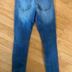 Kancan distressed jeans with‎ cuffed legs. thumbnail 3