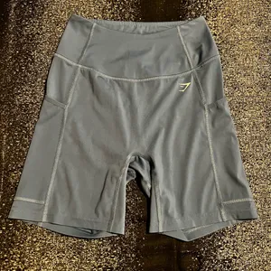 Womens small Gymshark High-Waisted Side Pocket Blue Biker Shorts 6" thumbnail 1