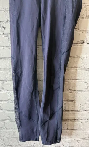Women’s lululemon  Navy Performance leggings size 4 thumbnail 1