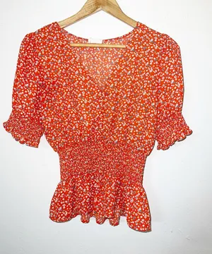Sienna Sky Bright Orange Floral Smocked Peplum Short Sleeve Blouse thumbnail 1