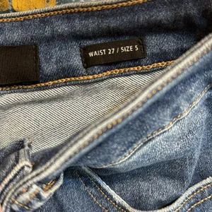 Risen Jeans Women's Distressed Raw Hem Flare Denim Blue Size 5/27 thumbnail 12