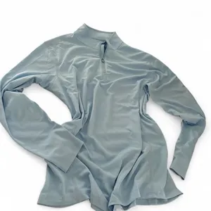 Baby blue long sleeve quarter zip athletic top in a women's size Large thumbnail 1