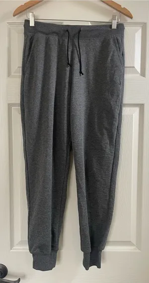 NWT Women’s Nike Yoga Jogger Sweat Pants Heather Dark Gray Size M thumbnail 1