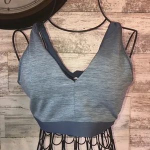Nike sports bra blue in color size large blue Nike sports bra twist bra workout thumbnail 1