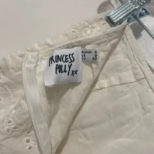 Princess Polly White Eyelet Ruffle Wrap Mini Skirt | Size 0 thumbnail 4