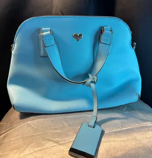 Blue Saffiano Dome Satchel Bag with Gold Heart Detail and Striped Lining thumbnail 1