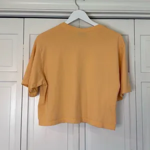 Nike orange cropped pocket front t shirt size M thumbnail 10