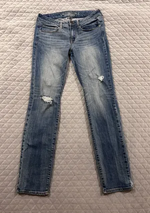 American Eagle jeans distressed skinny stretch low rise med wash thumbnail 1