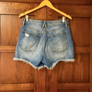 Good American Blue Distressed Jean Shorts thumbnail 8