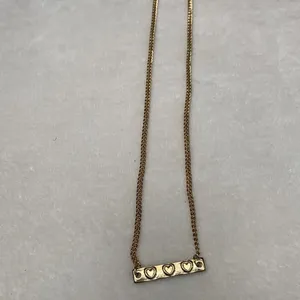 Gold Tone Three Heart Bar Necklace thumbnail 7