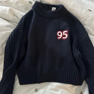 Navy Blue Sweater with Red Accent thumbnail 1
