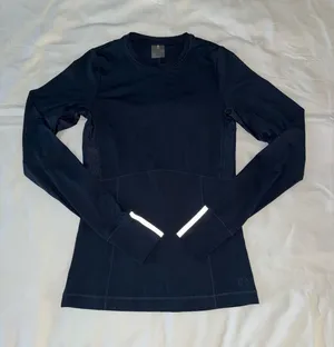 Calia by Carrie Dark Blue Long Sleeve Running Top With Breathable Panels And Reflective Detail thumbnail 1