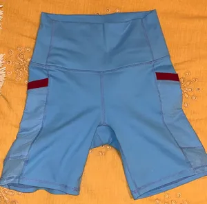 Fabletics powerHold blue biker shorts thumbnail 1