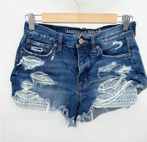 American Eagle Vintage Hi-Rise Festival Blue Distressed Denim Shorts‎ Size 2 thumbnail 1