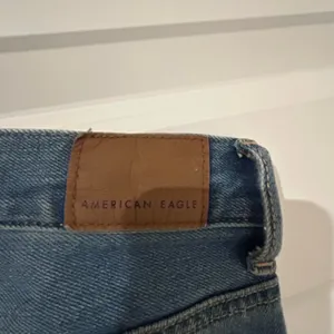 American Eagle Ripped Mom Jeans Blue Size 00 Short thumbnail 7