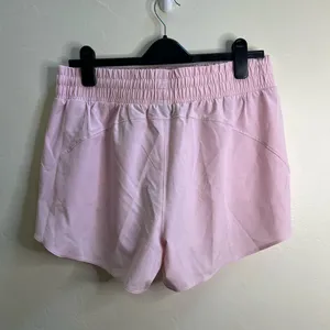 Under‎ Armour Light Pink Women's Athletic Shorts thumbnail 2