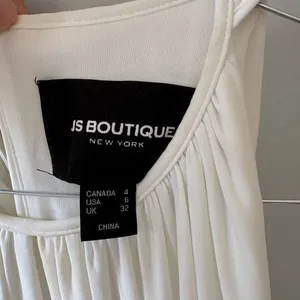 JS Boutique White Cocktail Midi Dress with Silver Sequin Waistband thumbnail 4