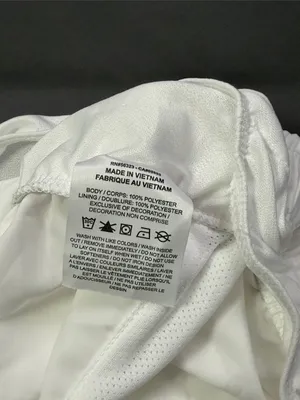Nike Women’s White Athletic Running Shorts with Reflective Swoosh thumbnail 4